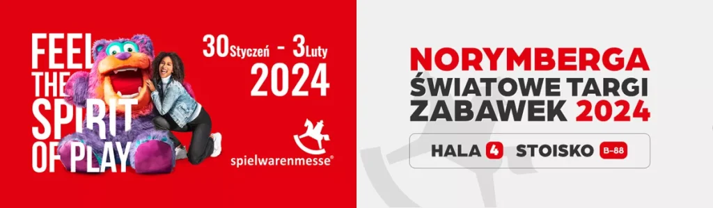 Banner de Spielwarenmesse 2024 con mascota gigante, lema Feel the Spirit of Play y datos del stand en Núremberg